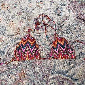 Luli Fama size Medium triangle top.